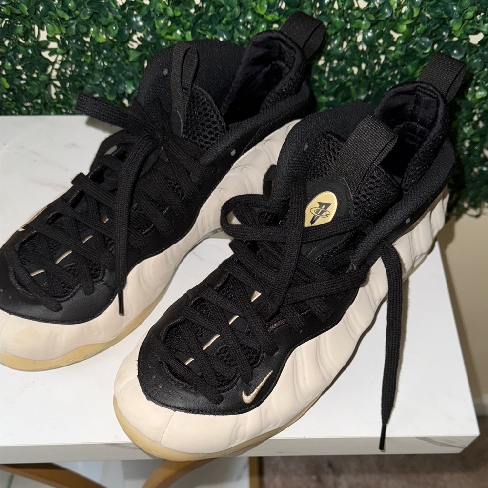 Nike Foam Posites Black and Cream High-Top Sneakers